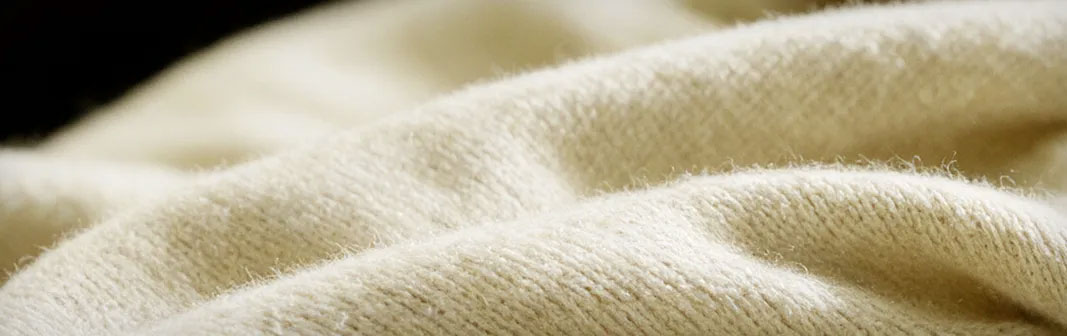 Musky notes — soft cream-colored wool fabric