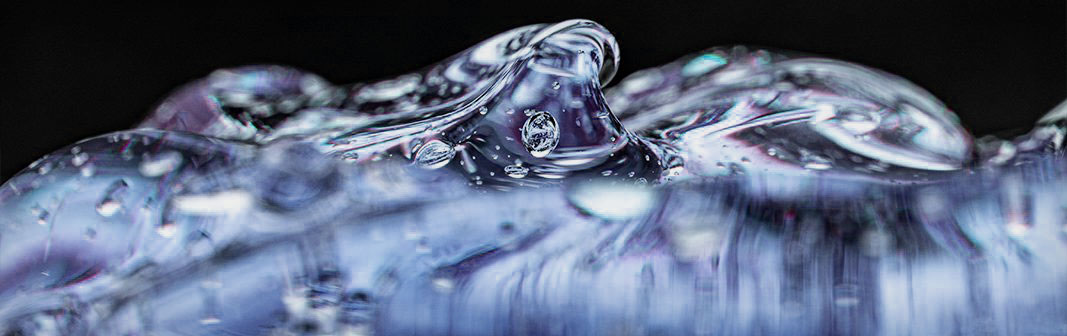 Aldehydic notes — glossy silvery-blue liquid bubbles with a soap-like sheen