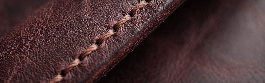 Leather notes — stitched leather texture