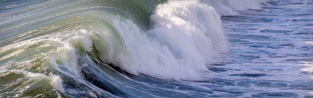 Marine notes — an ocean wave breaking on shore