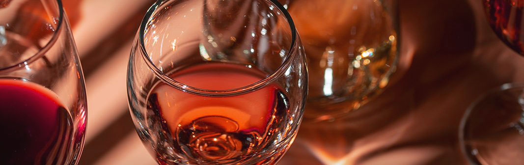 Boozy notes — glasses of wine and whiskey